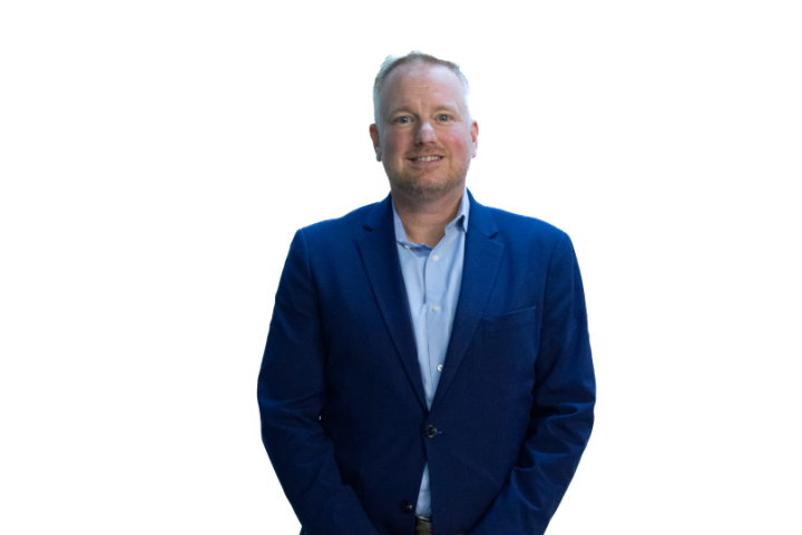 Michael Woodhead, CEO of Resolve Medical Bills, photographed against a black and white background.